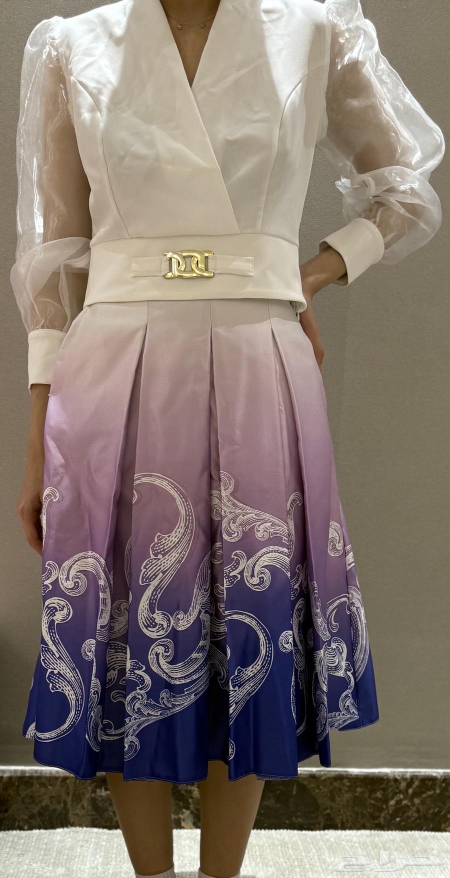 Two pieces: a blouse with a new skirt63494278857218112