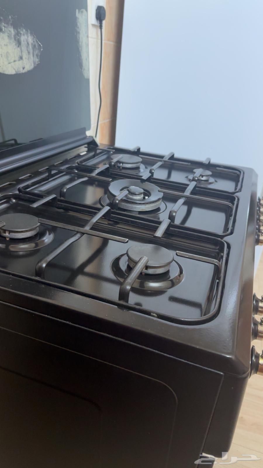 A semi-new oven with the front glass broken but its frame is intact64502927633025113