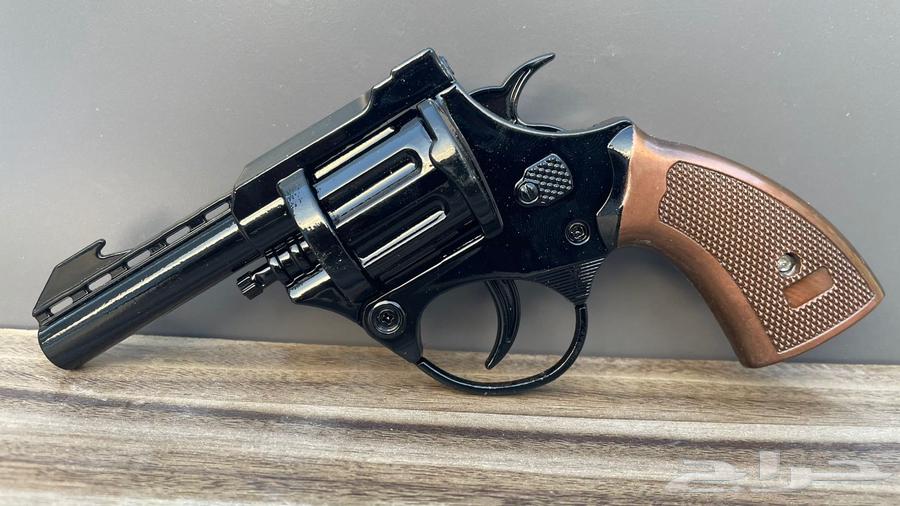 A gun with a silencer ((not real))63119311425922113