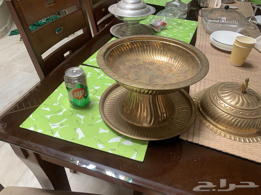 A large copper-covered dish with dates63151155631105113