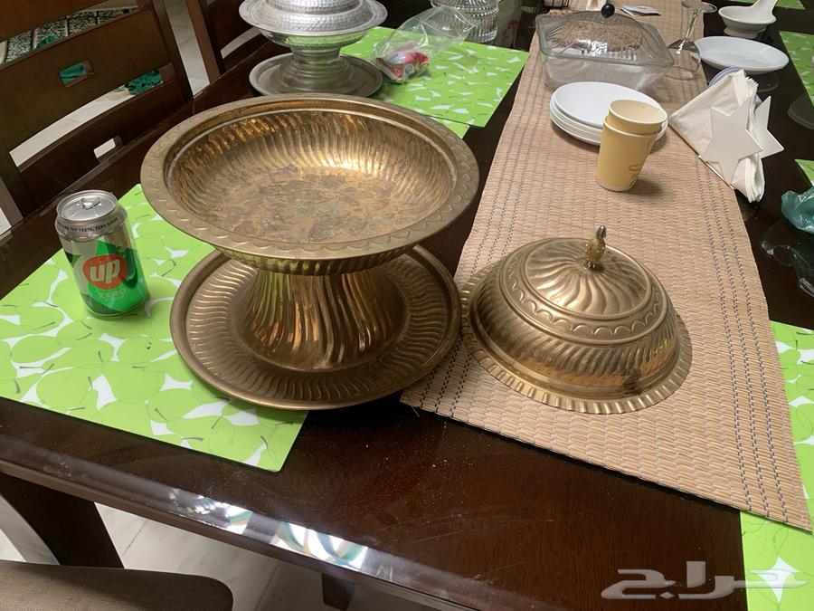 A large copper-covered dish with dates63151155631105111