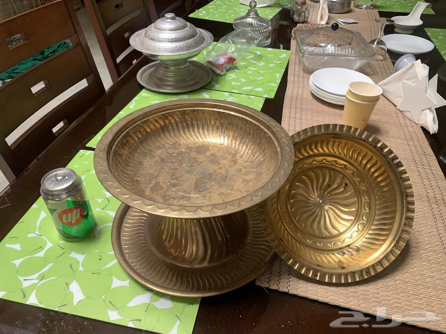 A large copper-covered dish with dates63151155631105114