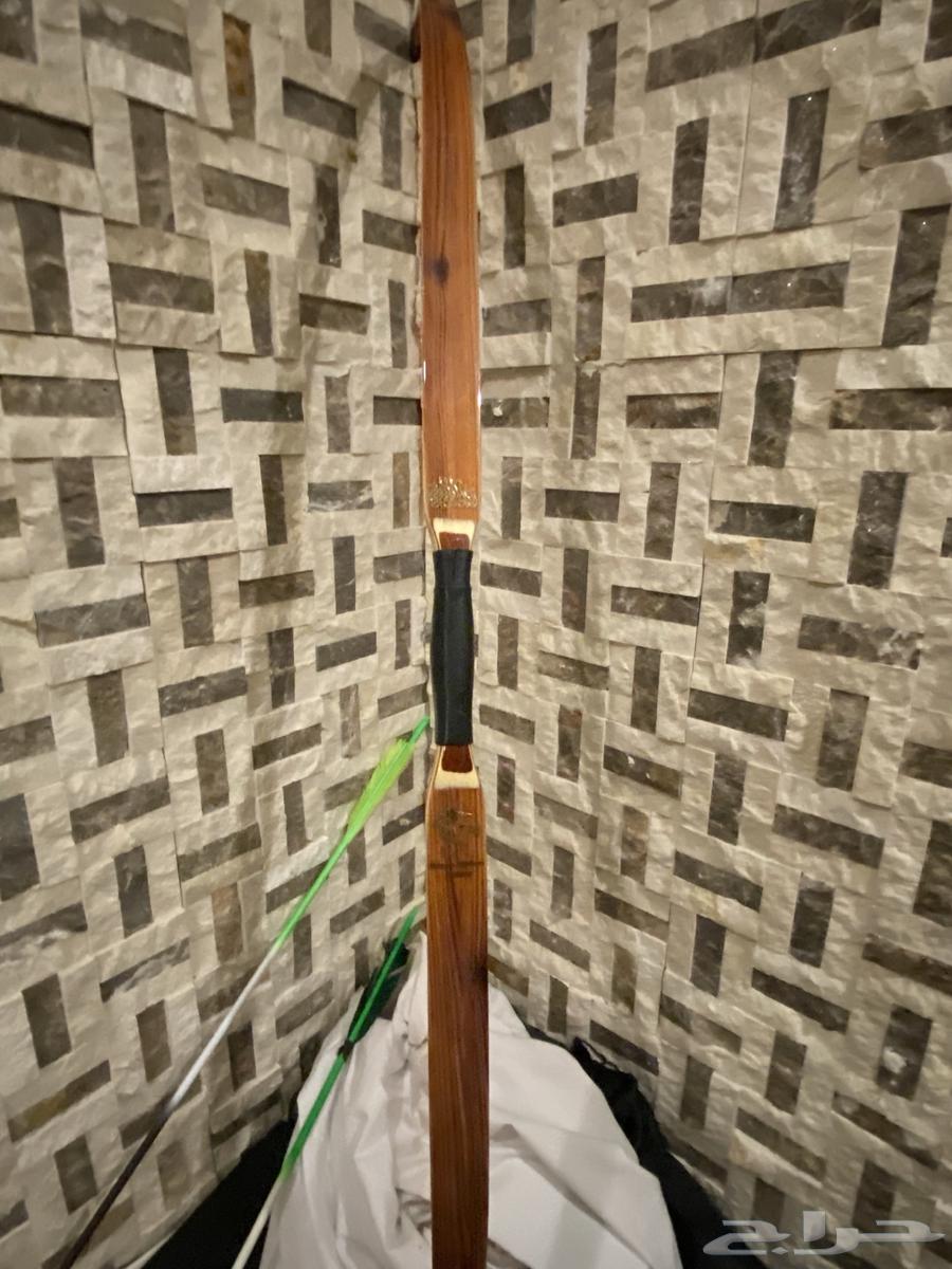 An authentic Arabic bow, dark in portrayal yet artistic, but it lacks the string and the arrow63482184583811111