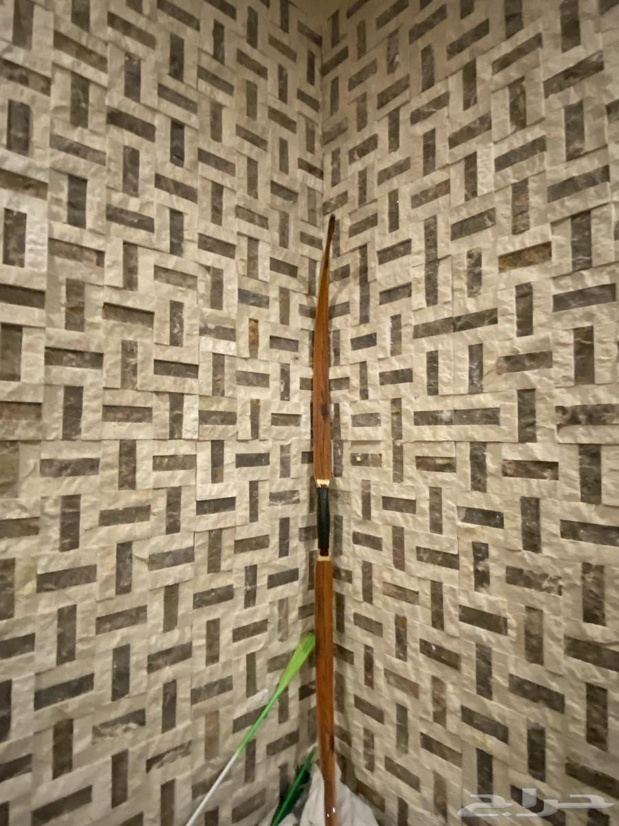 An authentic Arabic bow, dark in portrayal yet artistic, but it lacks the string and the arrow63482184583811112
