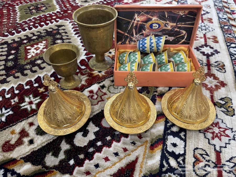 For sale, two coffee pots without handles and traditional coffee cups with Turkish measures.63105278157187113