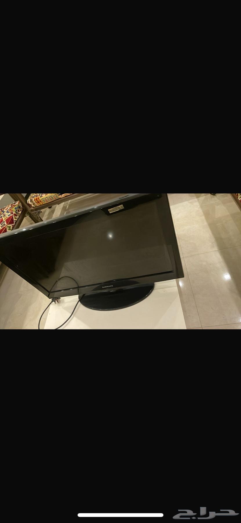 برادة ماء و شاشتين تلفزيون630104655676181124