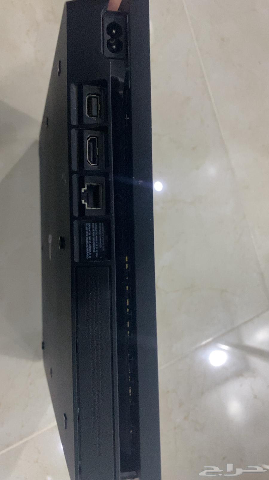 New Sony 4 with two hands and a tape63100507276803111