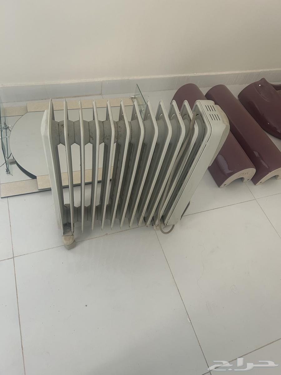 My new handmade sink, unused oil heater, mirror63084715500931113