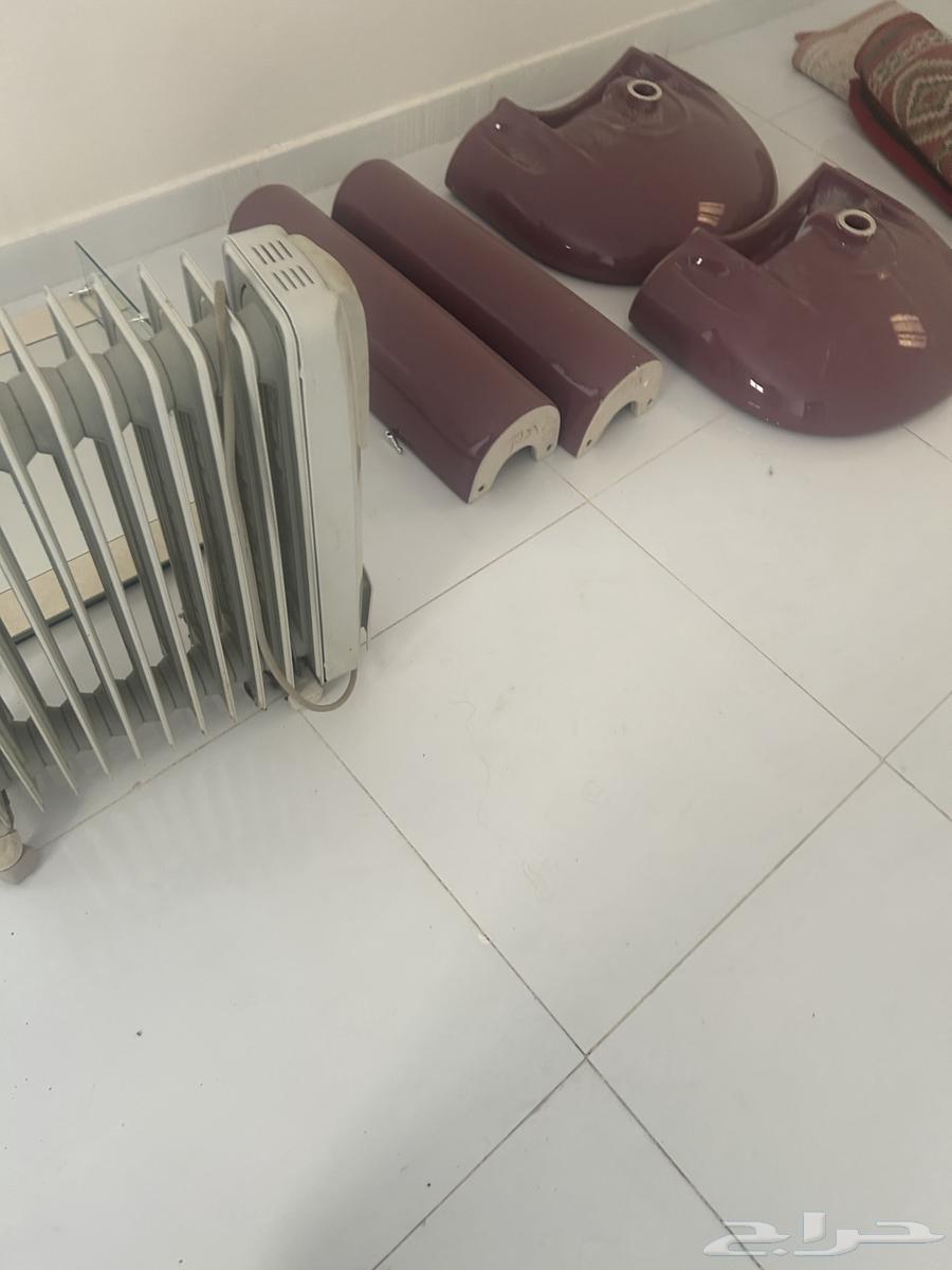 My new handmade sink, unused oil heater, mirror63084715500931114