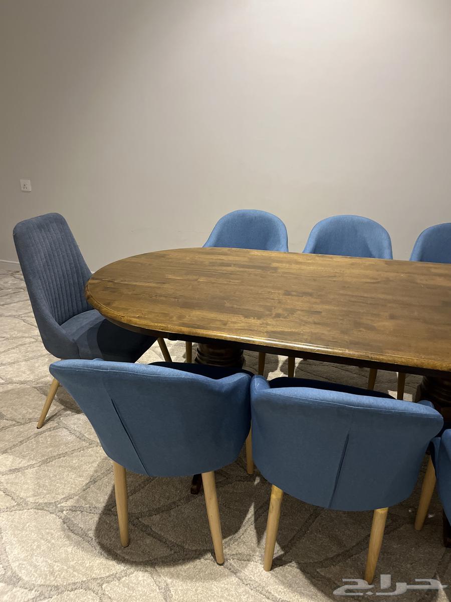 Wooden dining table and 8 chairs63081874332674111