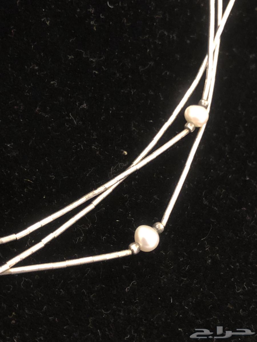 Silver ring sealed and mounted with a set of original pearls63080647667203112