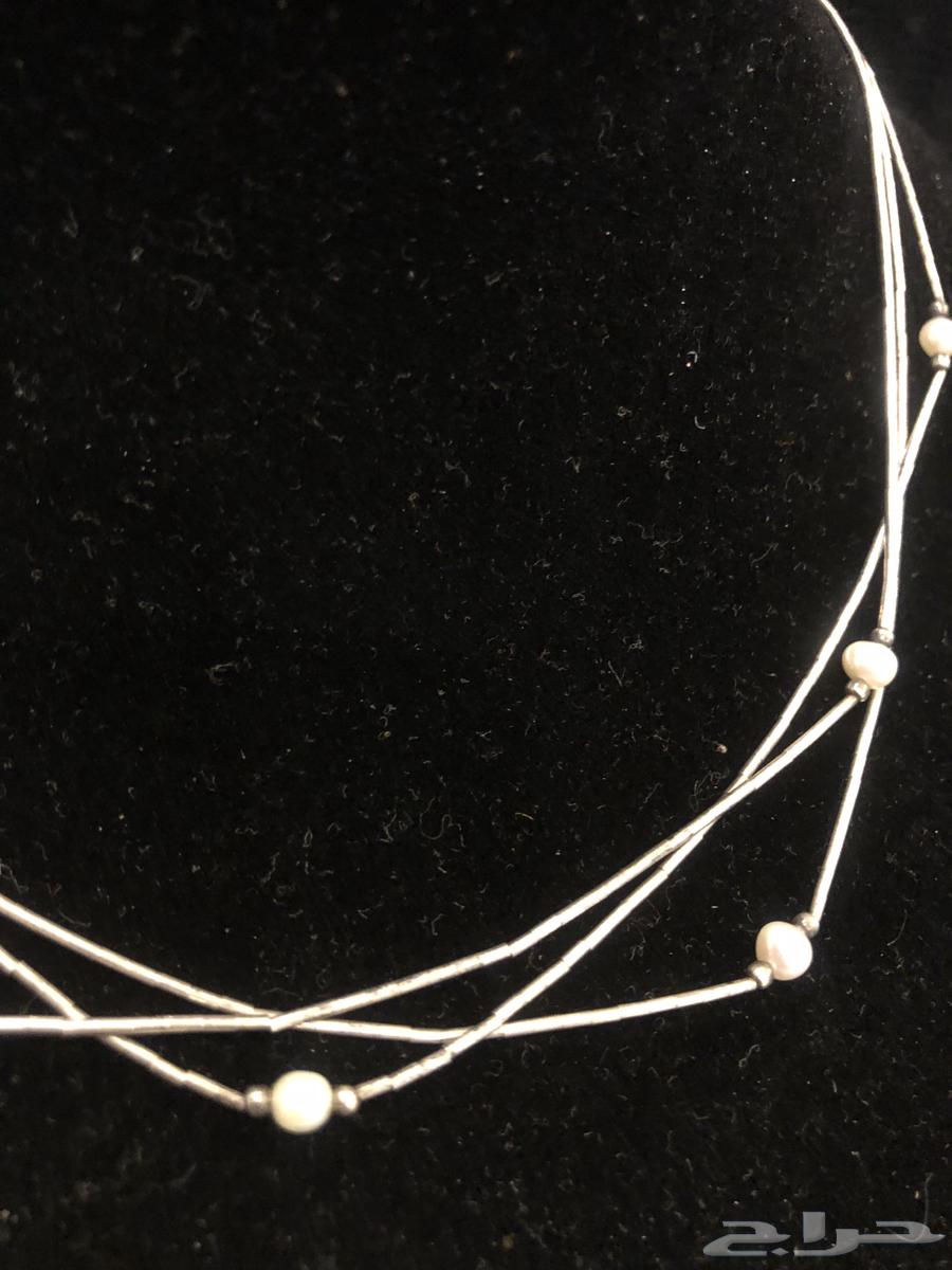 Silver ring sealed and mounted with a set of original pearls63080647667203111