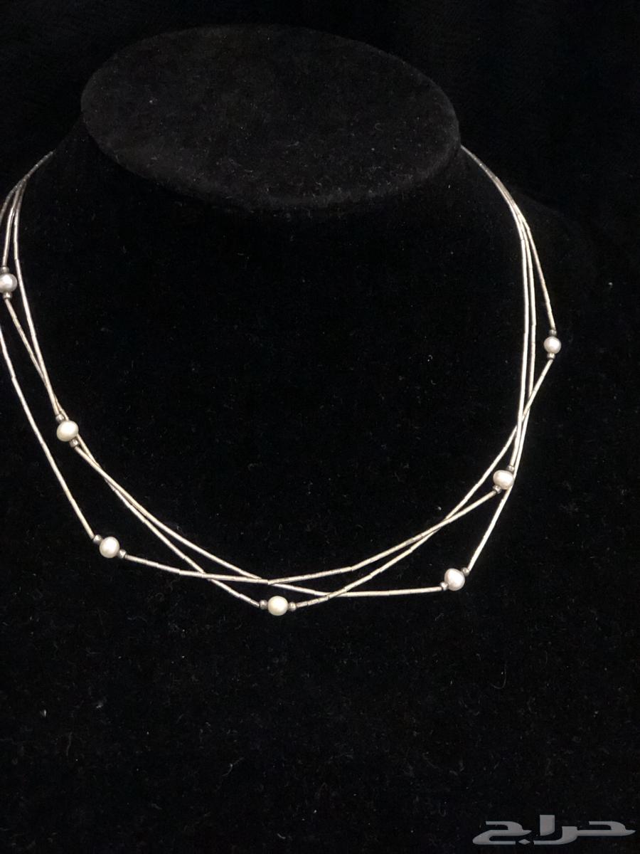 Silver ring sealed and mounted with a set of original pearls63080647667203114