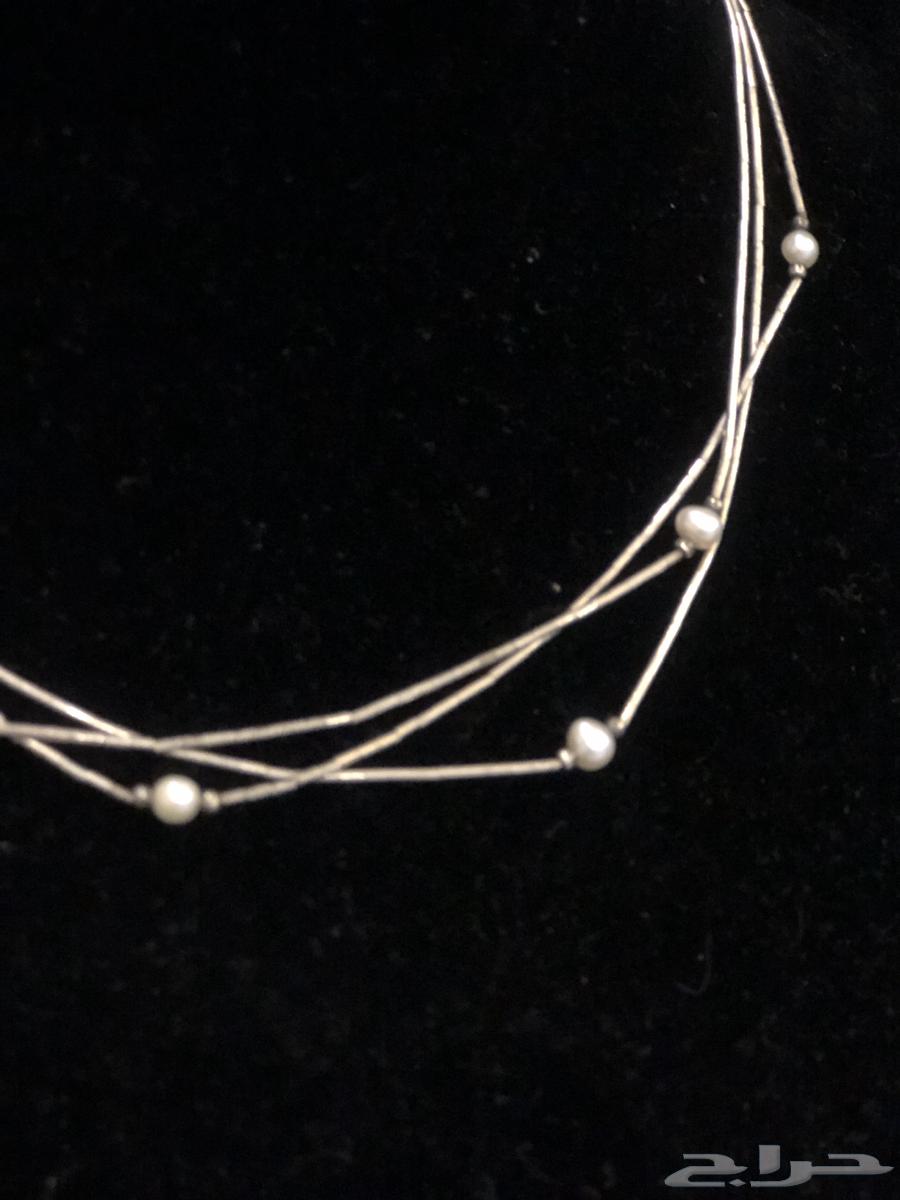 Silver ring sealed and mounted with a set of original pearls63080647667203113