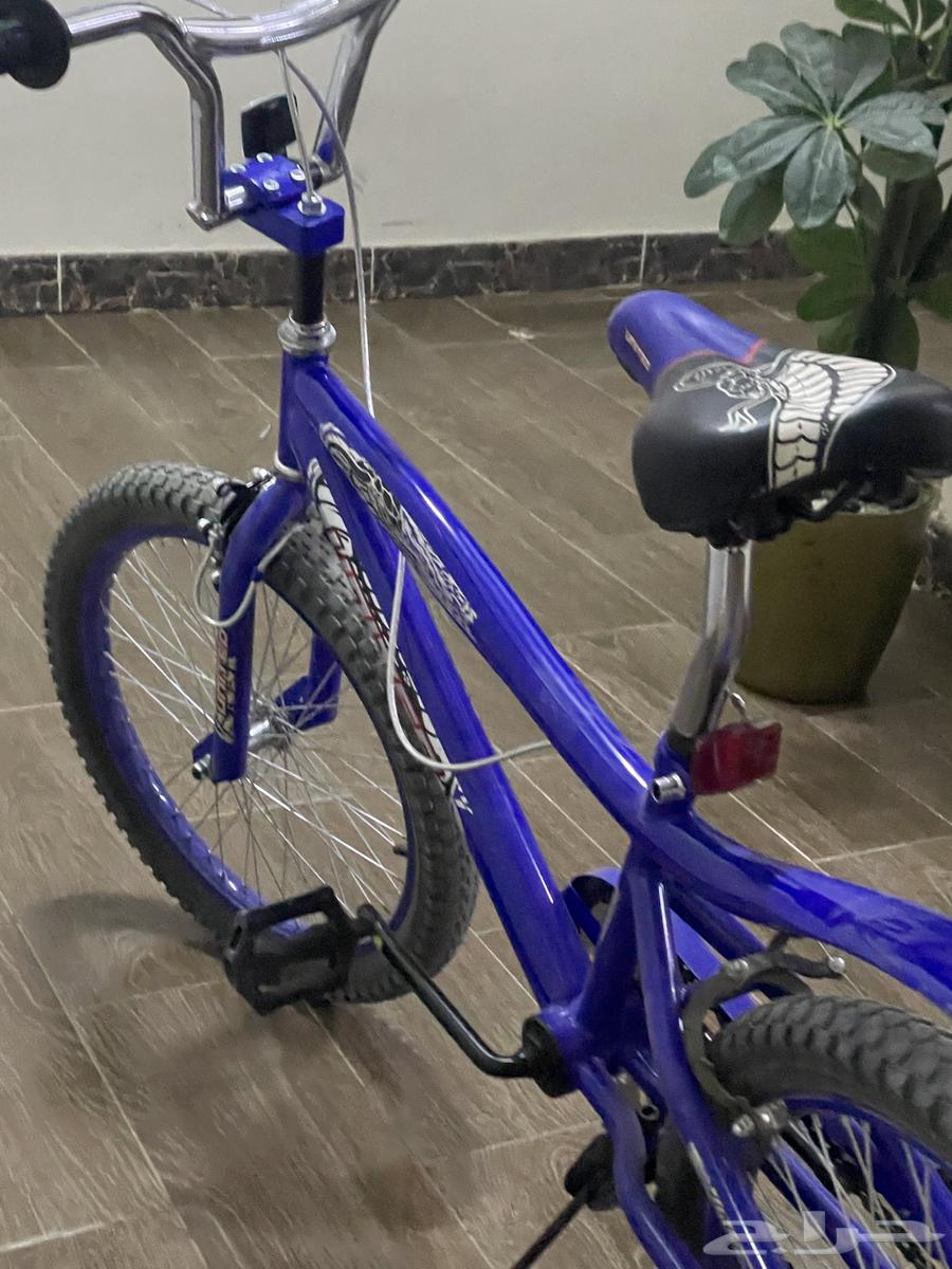 My bike is clean and I want someone to take a picture of my brother.63079378417025112