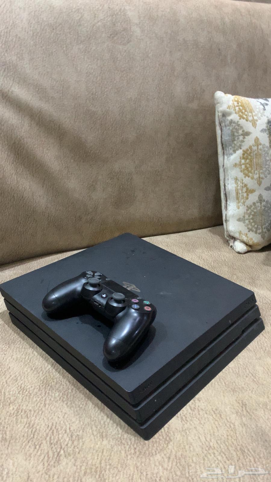 PlayStation 4 Pro with controller63075803099777111