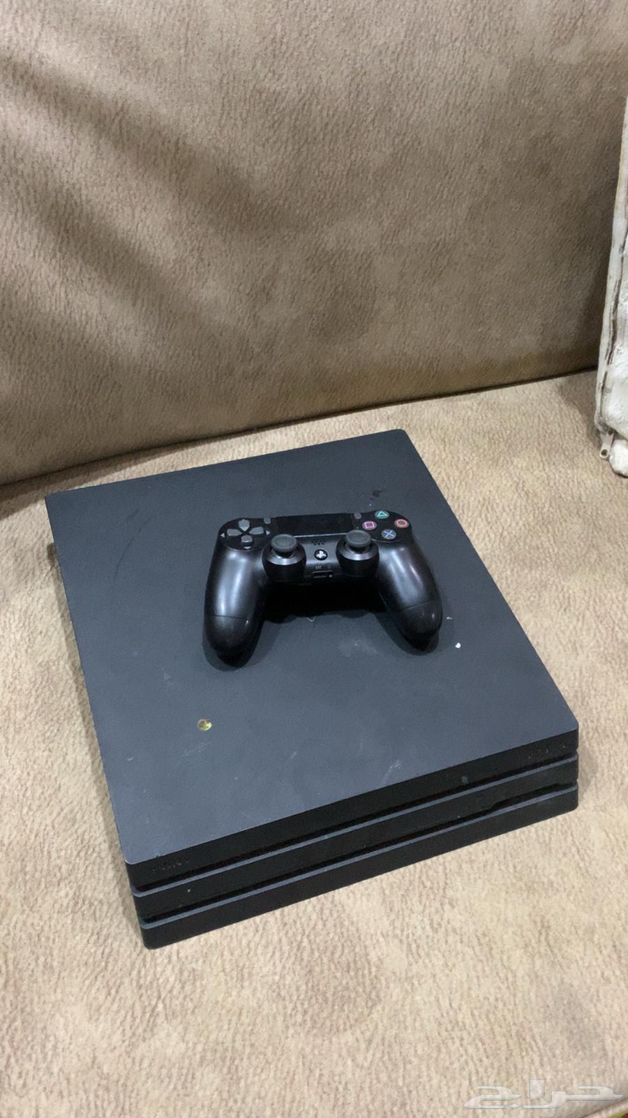 PlayStation 4 Pro with controller63075803099777112