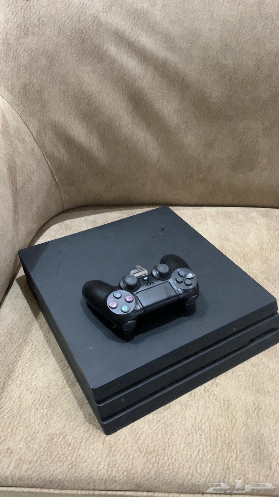 PlayStation 4 Pro with controller63075803099777112