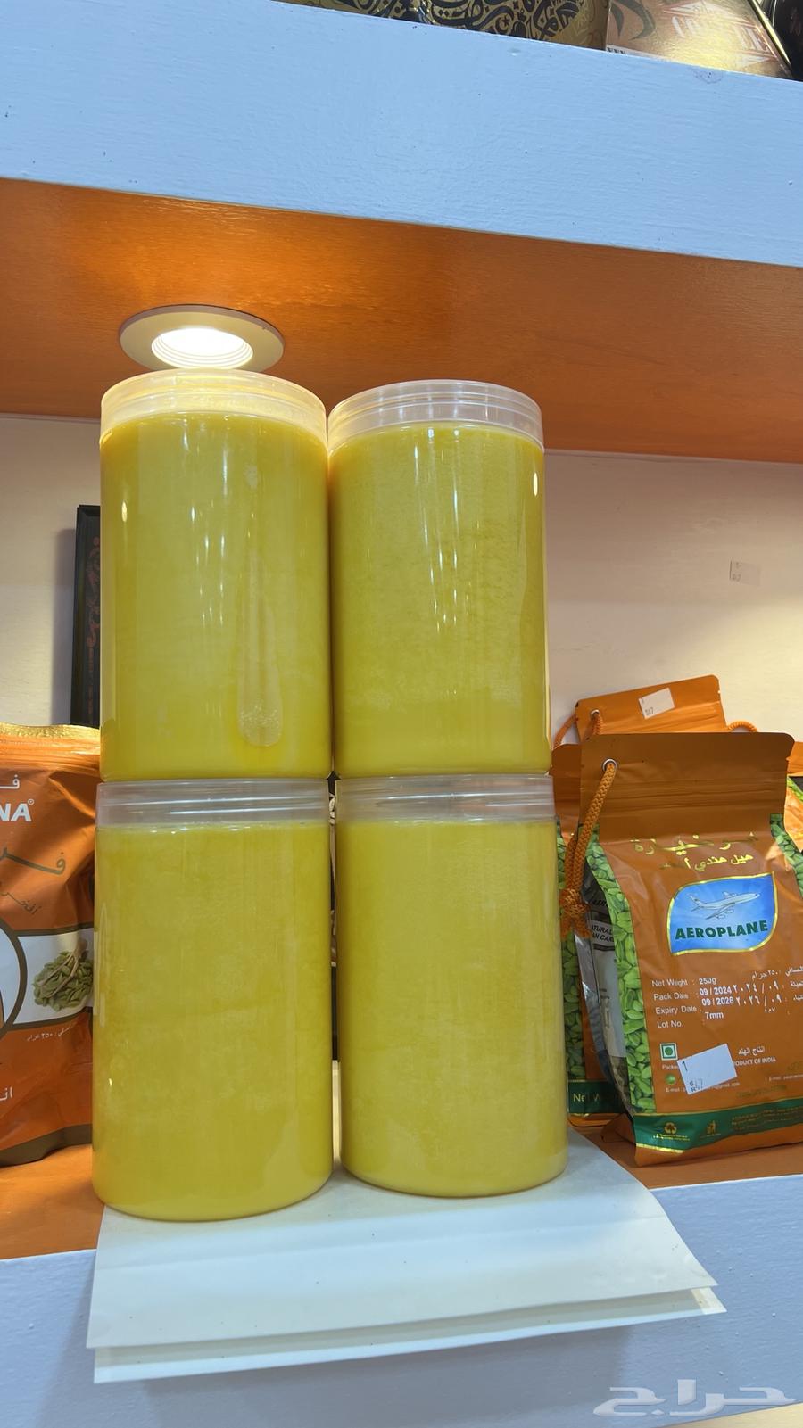 Cow ghee, clean and on the hand of an old woman in our shop630680032798741127
