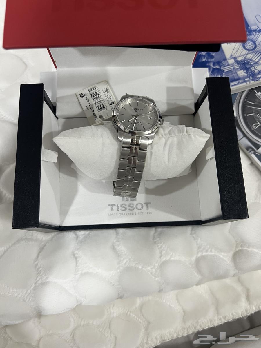 Tissot watch, new and unused, with its box and all accessories.63063669648129113