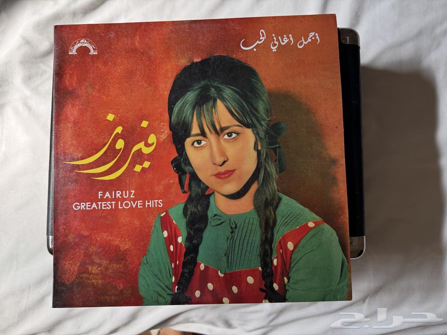 Musical instrument and a vinyl record by Fairuz63060756814849112