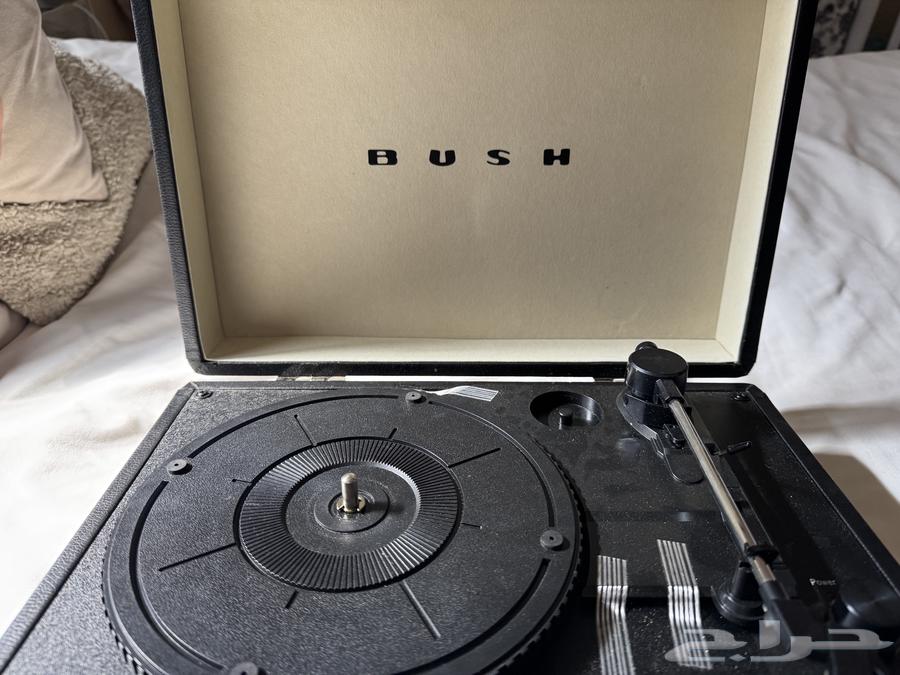 Musical instrument and a vinyl record by Fairuz63060756814849111