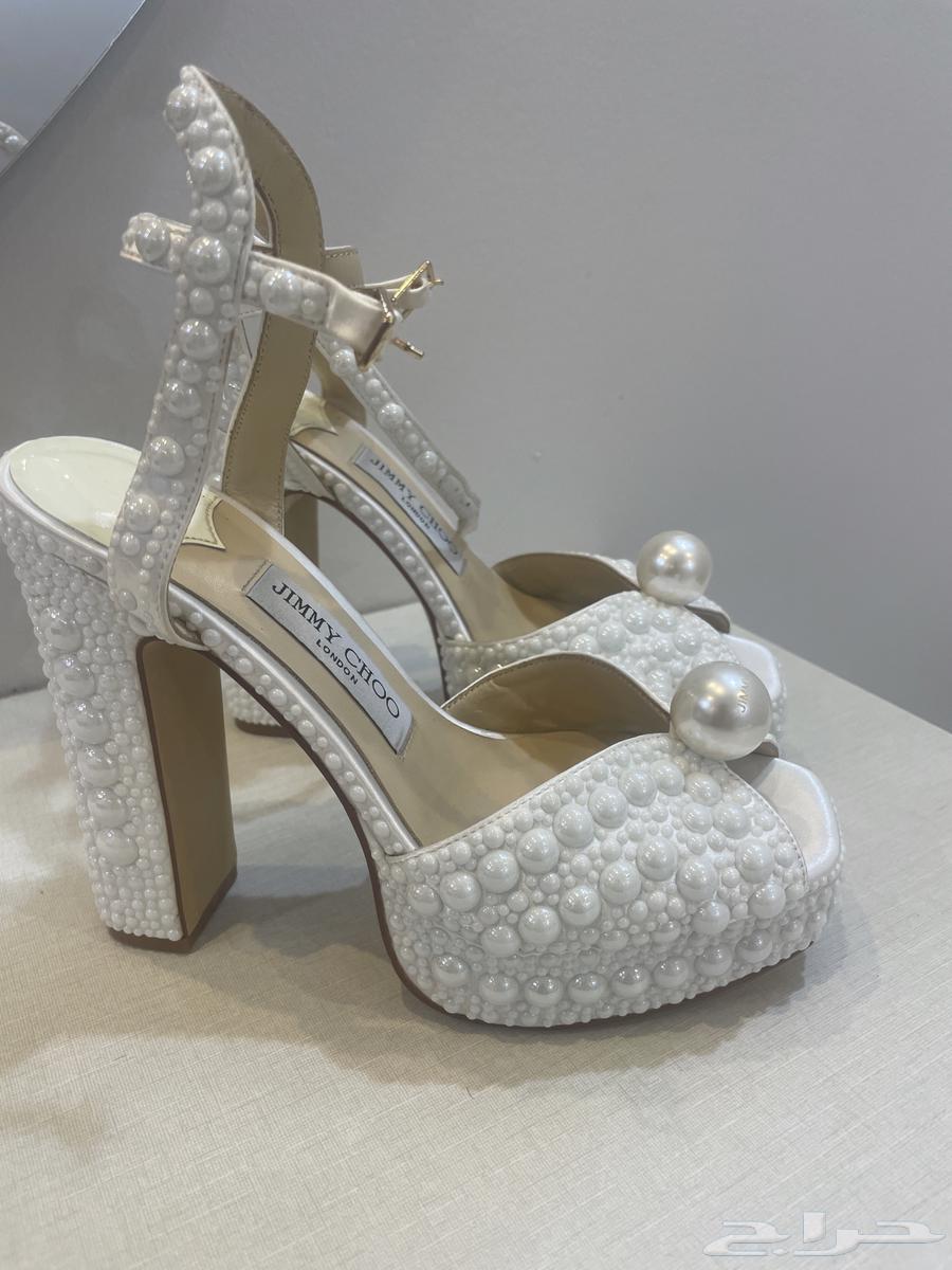 New wedding dress used only once, with veil, gloves, crown and heels63057171031043112