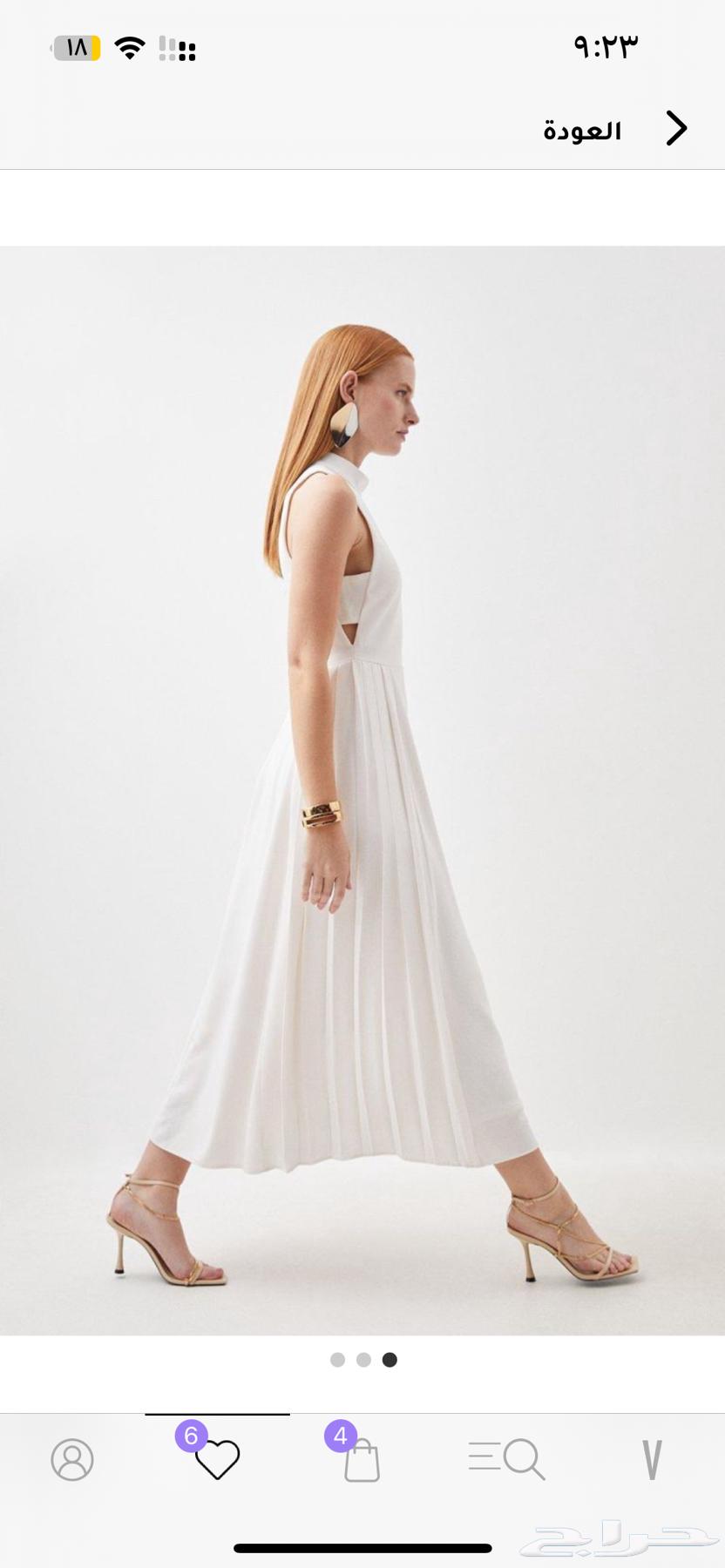 New dress never used from Karen Millen. Free delivery to Al-Jubail.63059646339329111