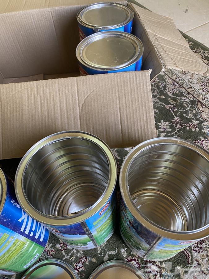 Empty milk cans for use in storing embers in them63051614097921112