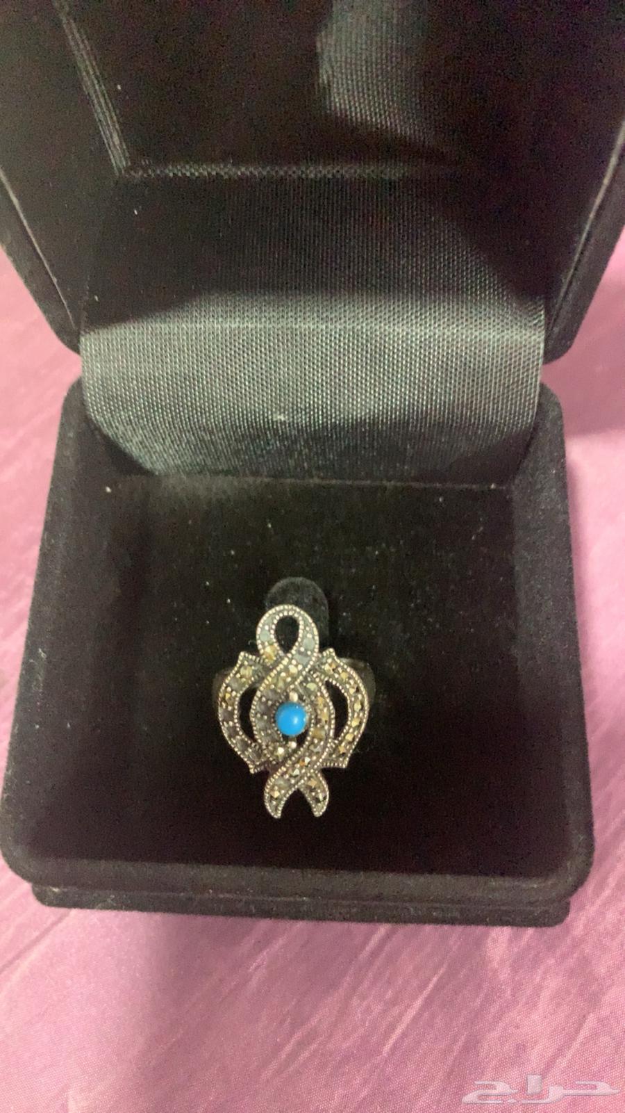 Silver ring with turquoise stone63050791609218111