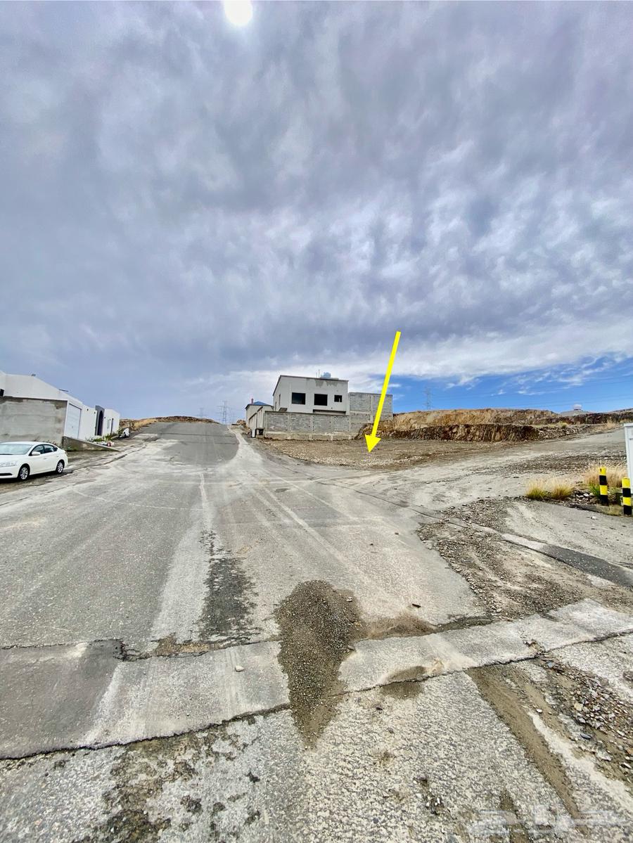 Land for sale in Abha, Shamia Al-Asim area, 285 thousand, two streets with title deed63014273914754113