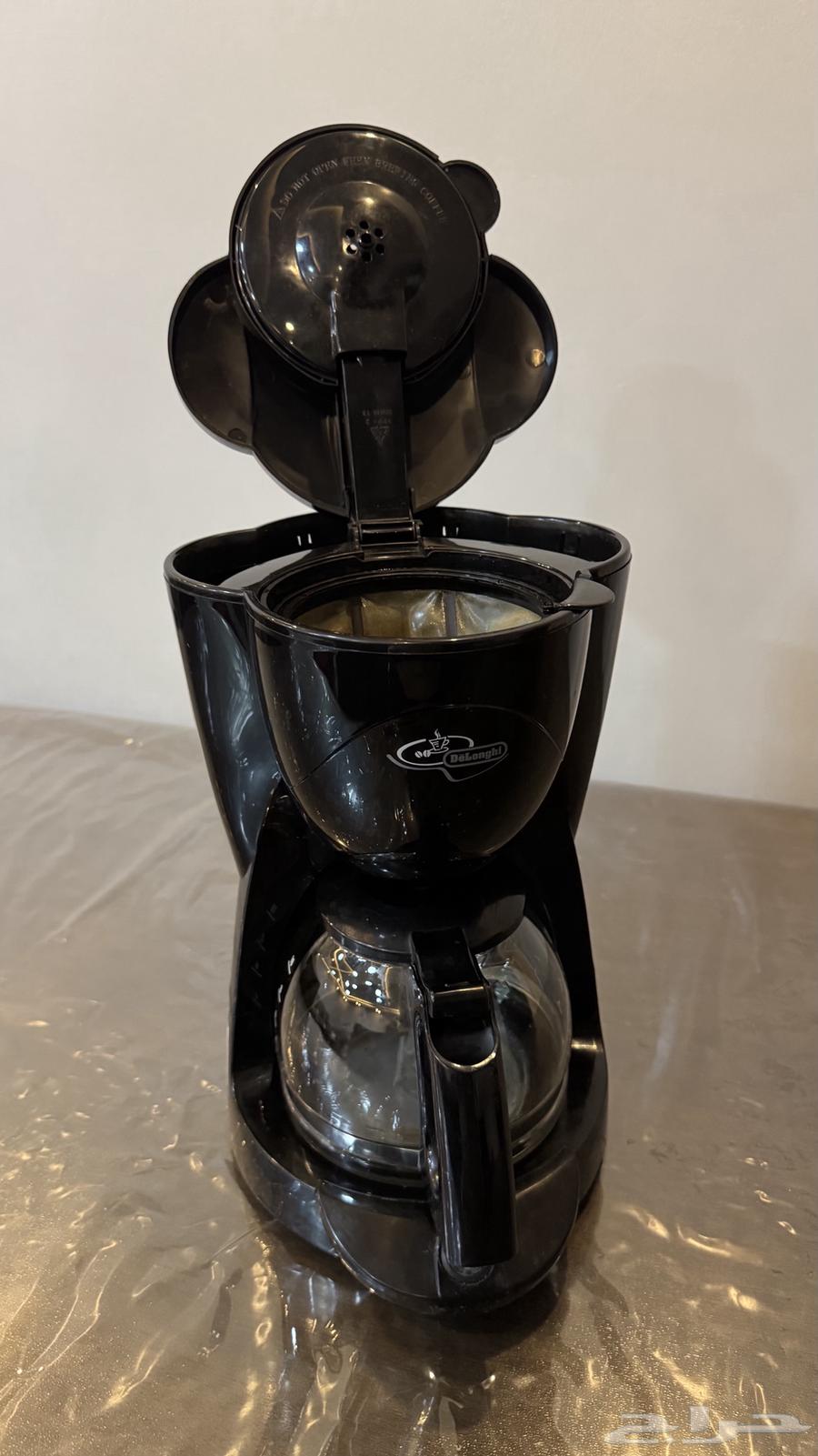 Delonghi coffee machine, black coffee in good condition for sale63034619373057119