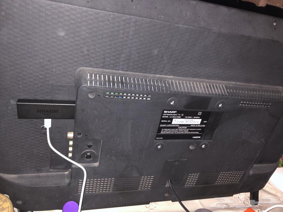 Sharp TV with remote. 32 inch LCD TV63016298904834111