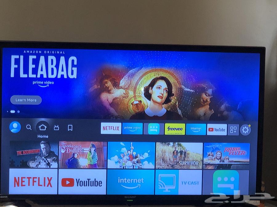 Sharp TV with remote. 32 inch LCD TV63016298904834112