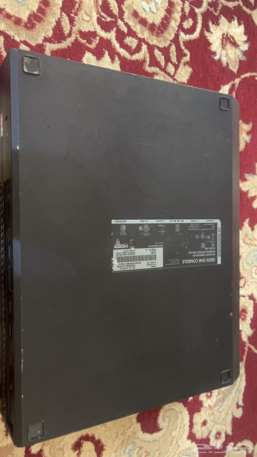 Xbox One console with a tape, I think it's Grand or Forza63612006082177112