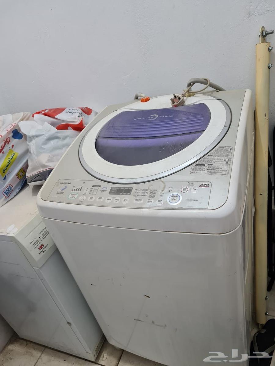 Two washers and a clean dryer, and a clean living room63419677573121114