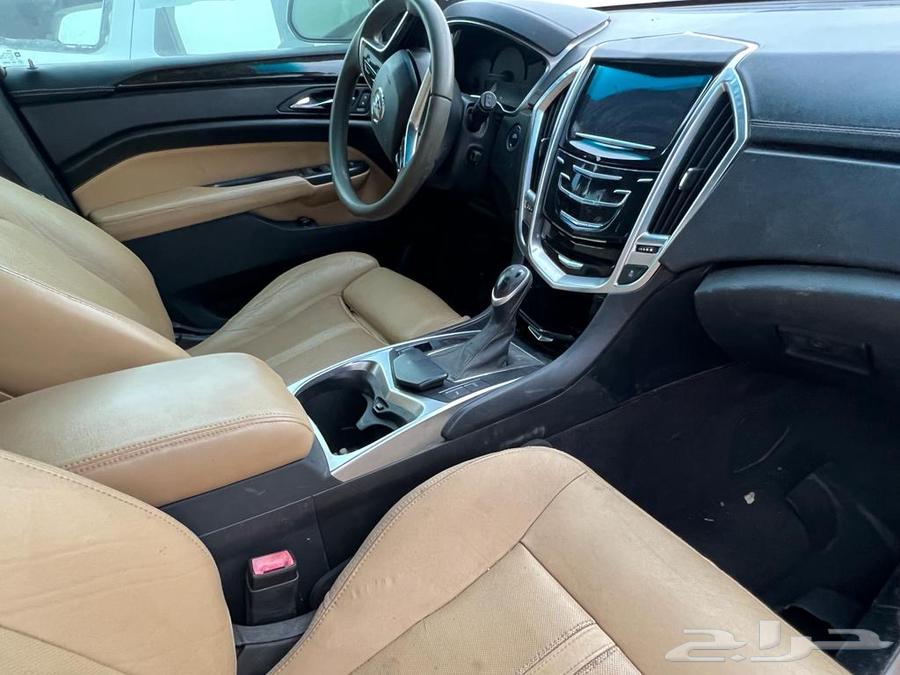 Cadillac SRX 2014 model, slightly damaged63613413101186113