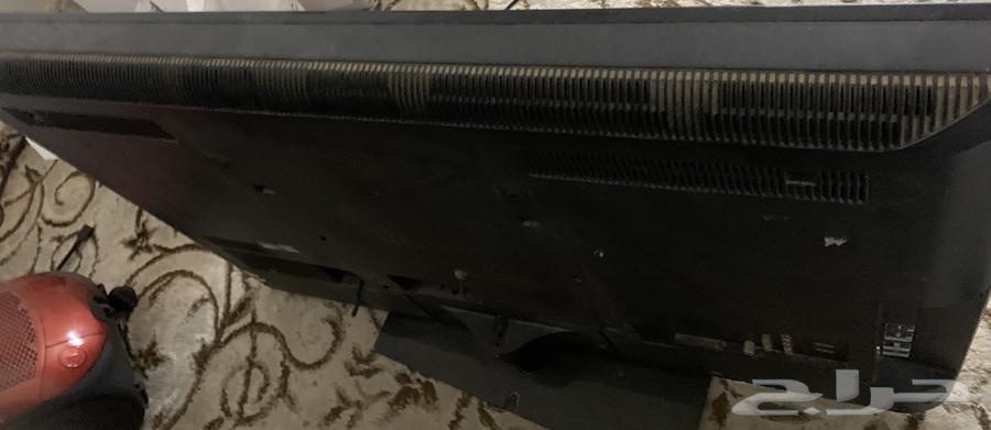 Sony 40-inch TV with table and washing machine63405435768321112