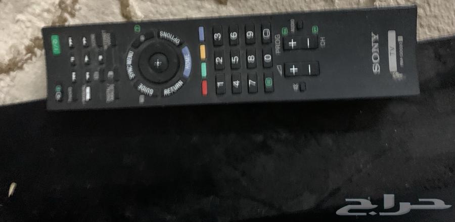 Sony 40-inch TV with table and washing machine63405435768321114