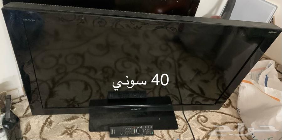 Sony 40-inch TV with table and washing machine63405435768321111