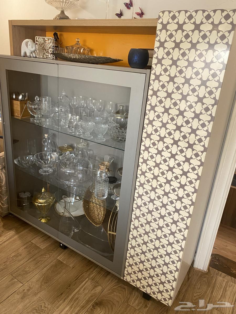 A large dining table with a buffet cabinet63376260857859113