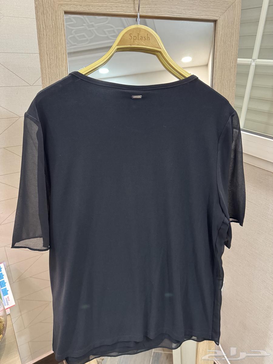 بلوزة ماركة دكني DKNY اصليه جديدة لم تستخدم63376906786818111