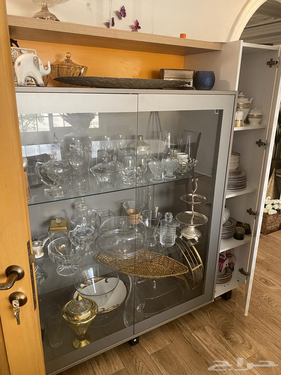 A large dining table with a buffet cabinet63376260857859114