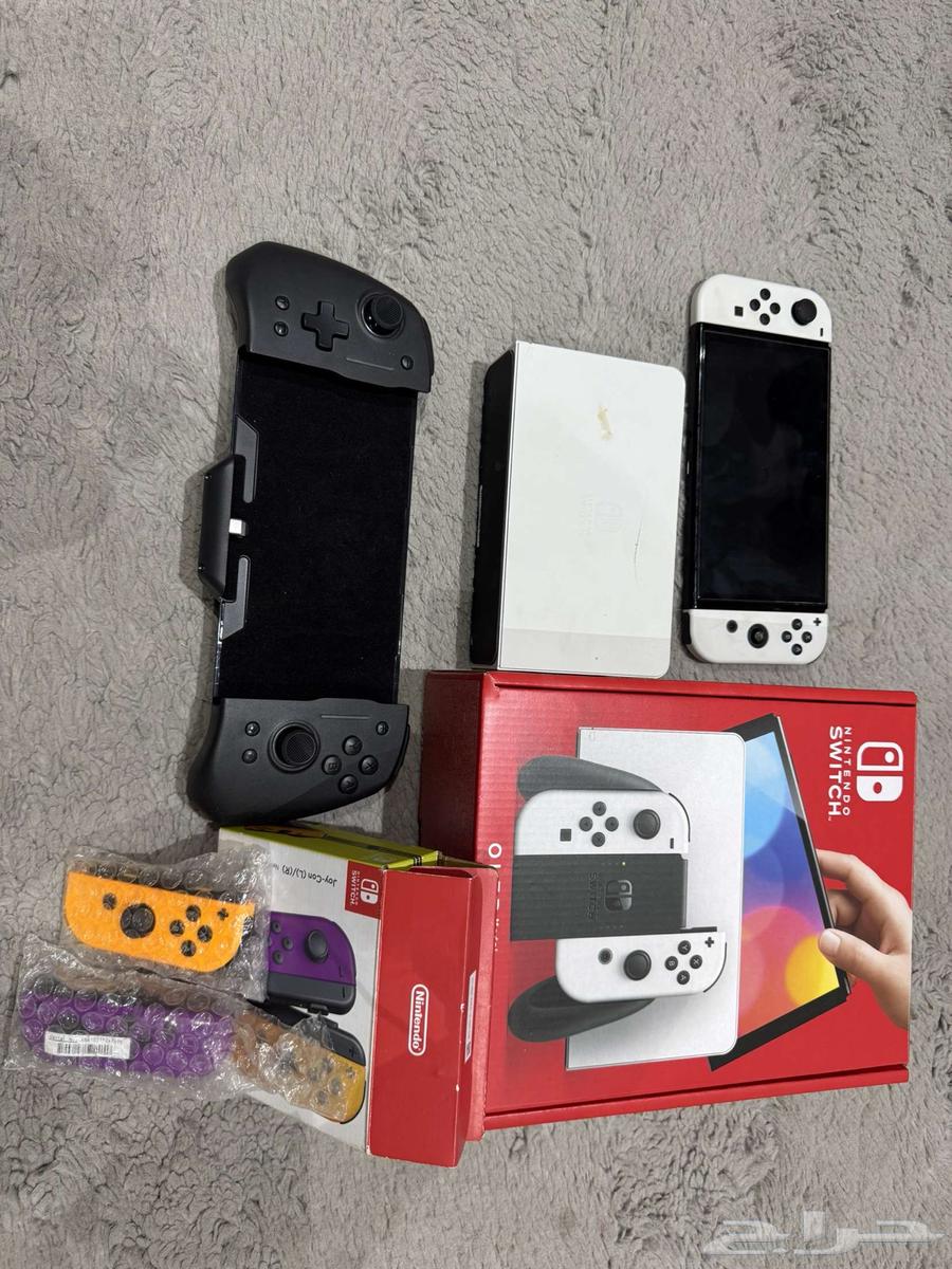 For sale: Nintendo Switch OLED with 4 Joy-Cons and a professional controller dock63366182053123114