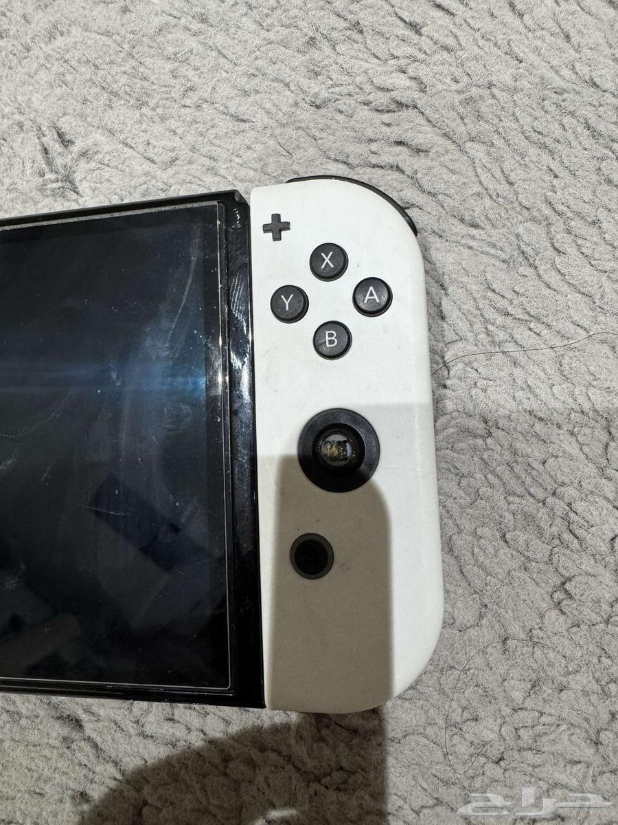 For sale: Nintendo Switch OLED with 4 Joy-Cons and a professional controller dock63366182053123111