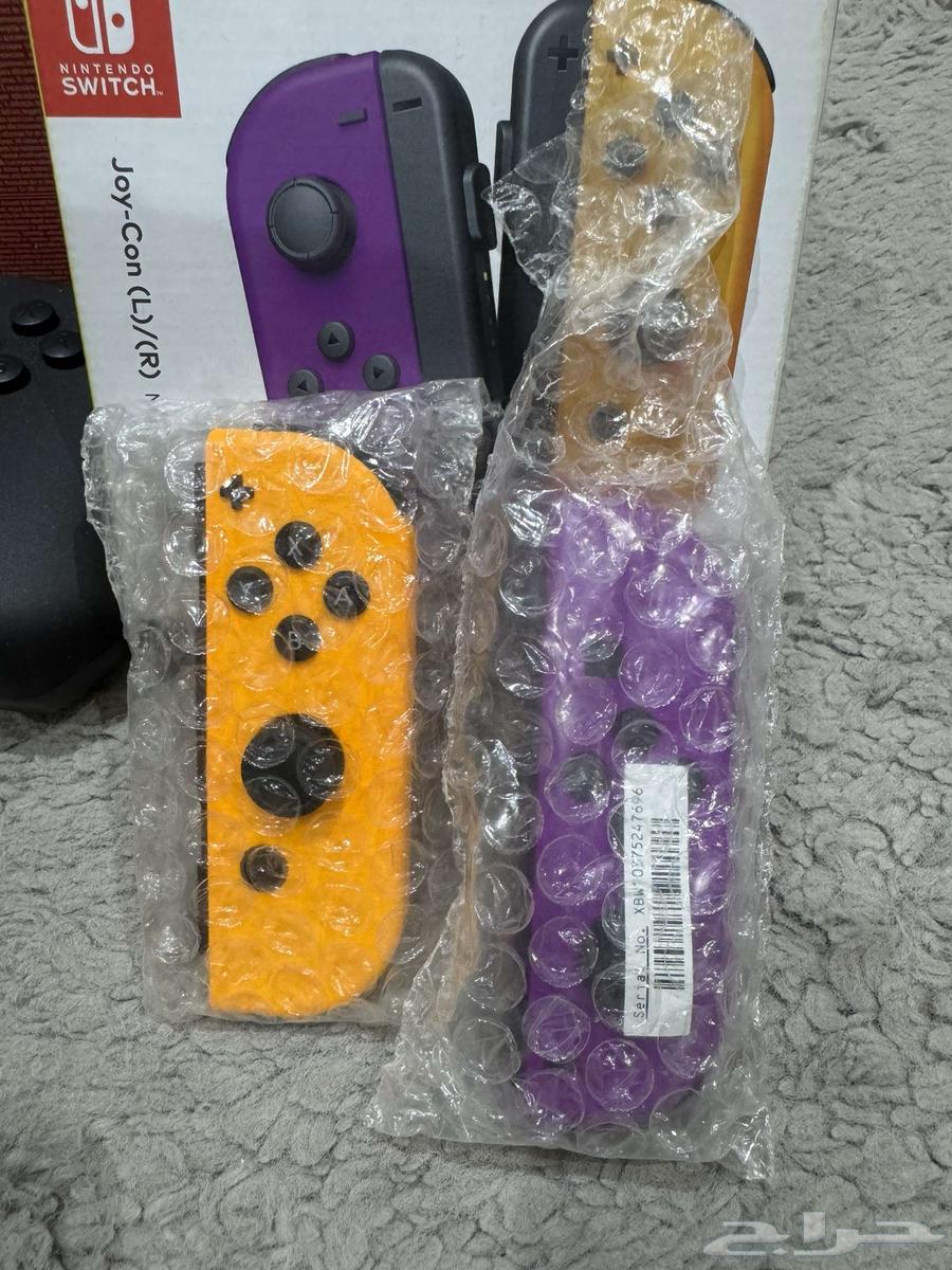 For sale: Nintendo Switch OLED with 4 Joy-Cons and a professional controller dock63366182053123113
