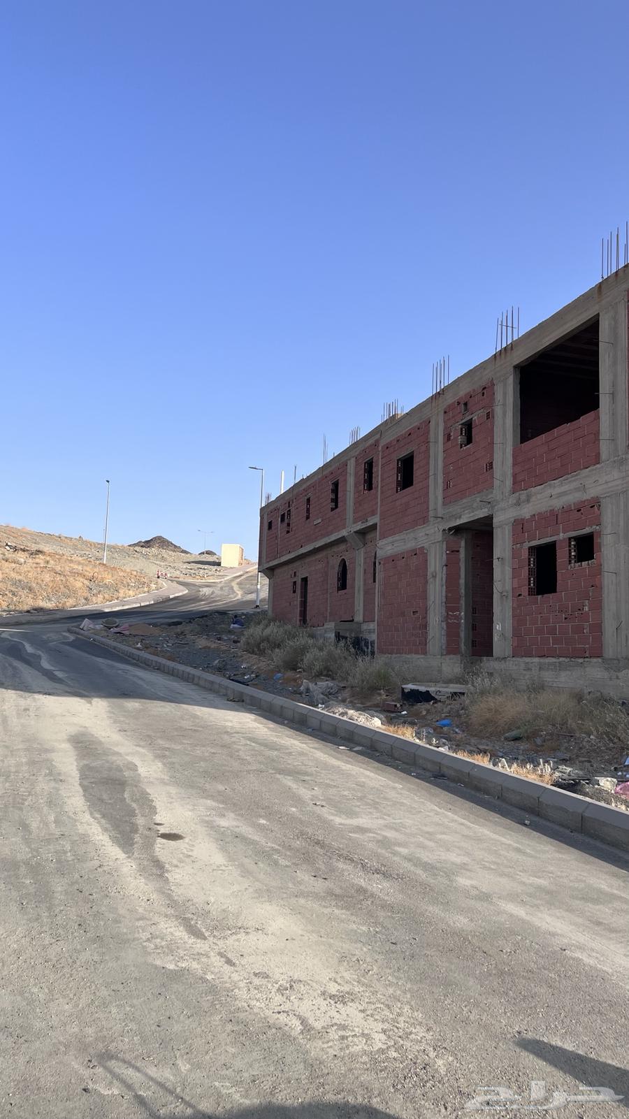 عمارتين مبنية عظم63351009524225111