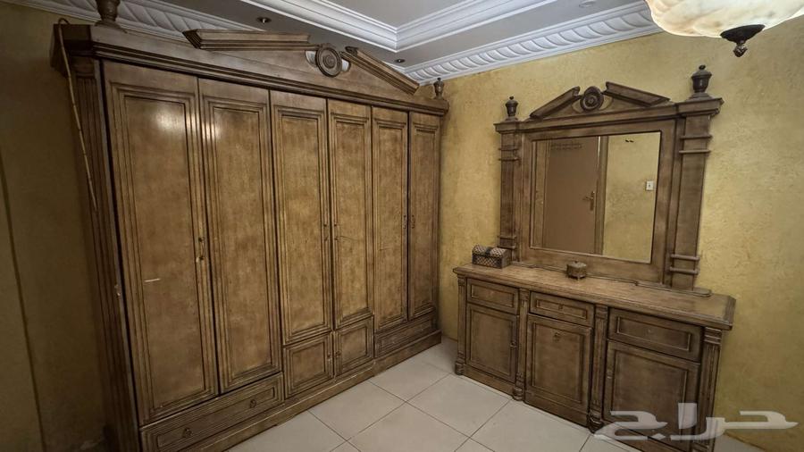 A wardrobe in very new condition and a dressing table with a chair633464042236181110