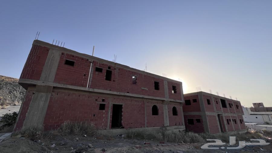 عمارتين مبنية عظم63351009524225114