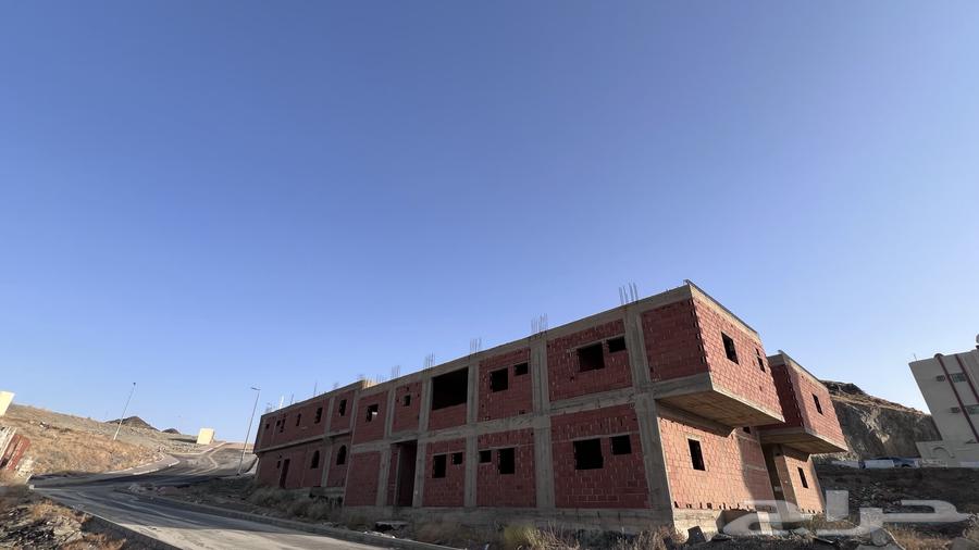عمارتين مبنية عظم63351009524225112